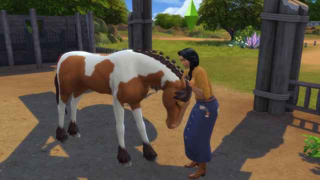 Bonding with a horse in The Sims 4