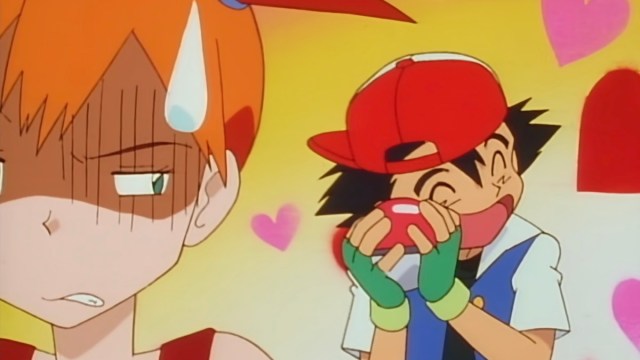 Ash is proud of the Pokemon he just caught, much to Misty's disgust