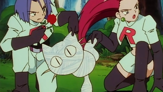 Team Rocket's Meowth has been hit with String Shot in the Pokemon anime